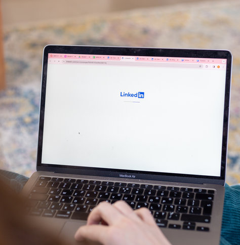 A laptop open to LinkedIn