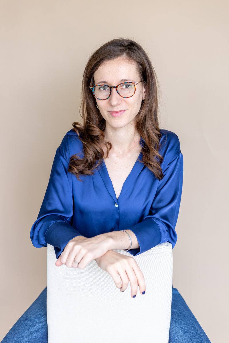 Sara Royf sitting and smiling